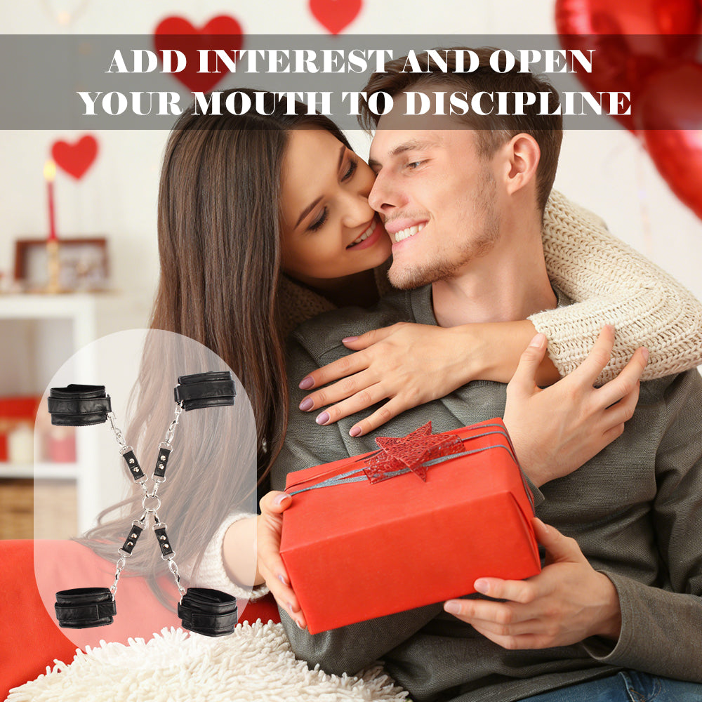 A man and woman hugging while holding a red gift box, with a circular inset showing black ankle chains connected by silver chains. White text at the top reads, 'ADD INTEREST AND OPEN YOUR MOUTH TO DISCIPLINE.