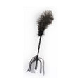 Black feather tickler with satin ribbons on a white background.