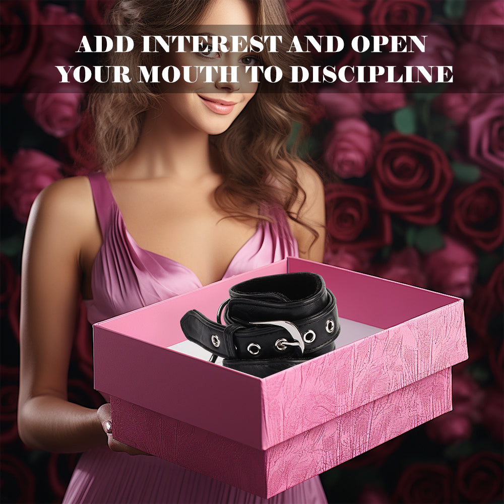 Black padded wrist cuffs displayed inside a pink gift box held by a lifestyle model