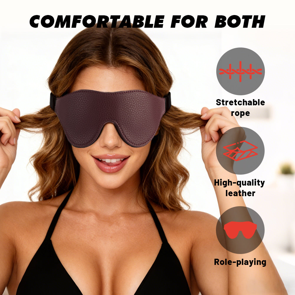 Woman wearing a burgundy padded blindfold with a stretchable back strap for sensory play